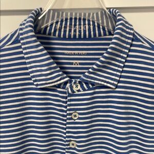 B. Draddy polo top